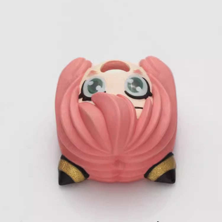 Custom Anya Forger artisan keycap in cute pink, featuring 3D details from SPY x FAMILY, ideal for anime fans and collectors.