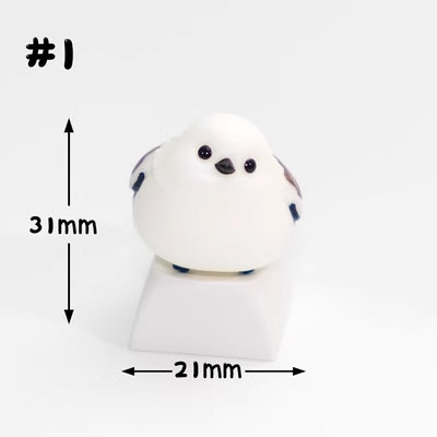 Embrace the charm of chubby mountain sparrows with our adorable white keycap. Add a touch of nature's delight to your keyboard. Tweet your way to a unique typing experience!