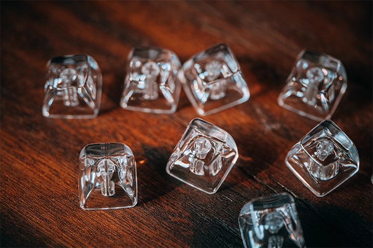"Dive into a realm of sophistication with our Transparent Keycaps – uniquely crafted with the texture of ice. These Artisan Keycaps are more than mere keys; they are a statement of individuality and craftsmanship. The crystal-clear design adds a touch of elegance to your keyboard, while the ice-textured finish provides a distinctive and cool aesthetic. Elevate your typing experience with the avant-garde appeal of these Transparent Keycaps – a perfect blend of style and functionality.