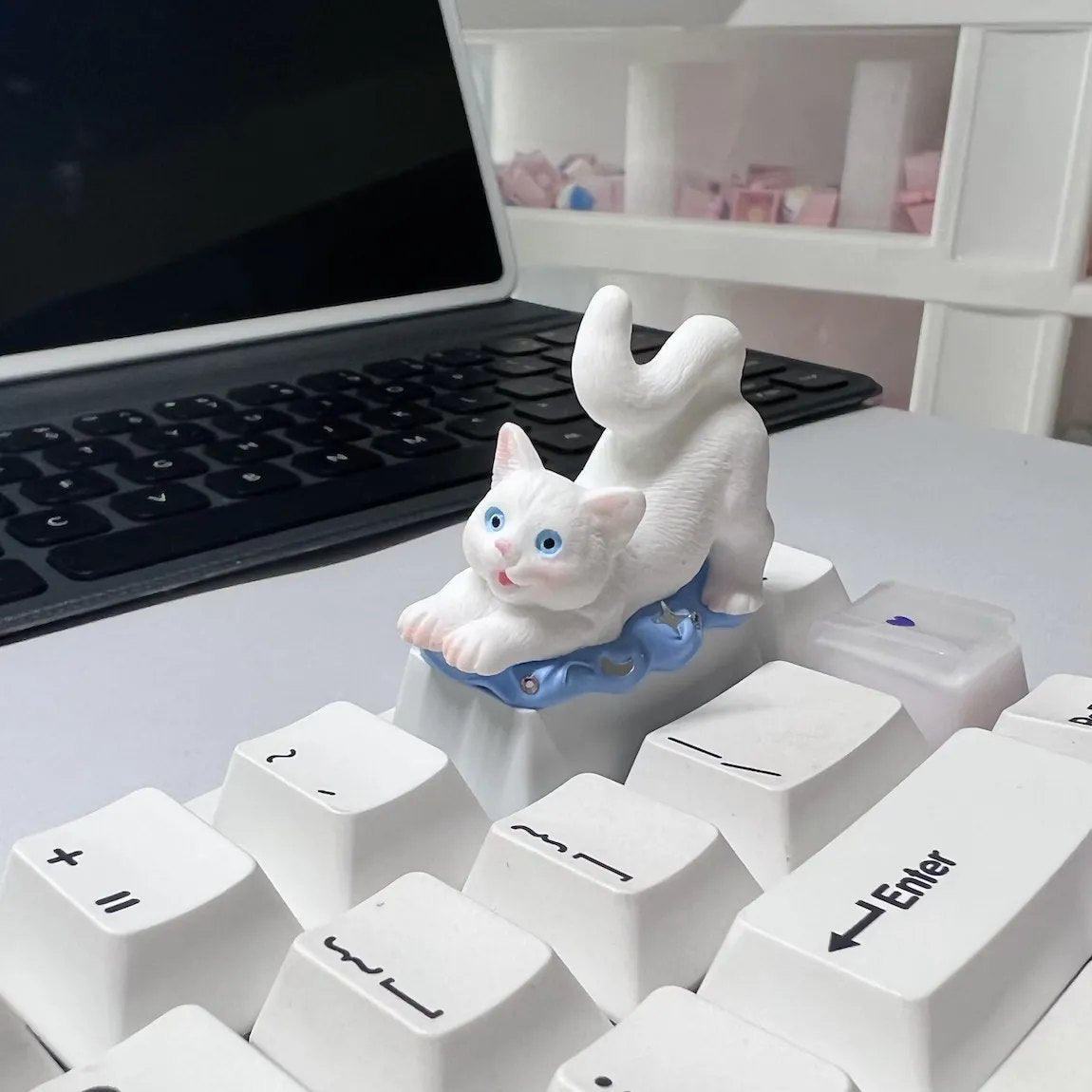Introducing our "Cute White Cat Backspace 2U" Artisan Keycap – a purr-fect addition to your keyboard. Crafted with meticulous detail, this keycap features an adorable white cat design, adding a touch of charm to your mechanical keyboard. The 2U Backspace key becomes a canvas for the playful antics of our feline friend, making it an eye-catching and whimsical choice for cat lovers. Elevate your typing experience with this delightful keycap and let the cat-lover in you shine through.