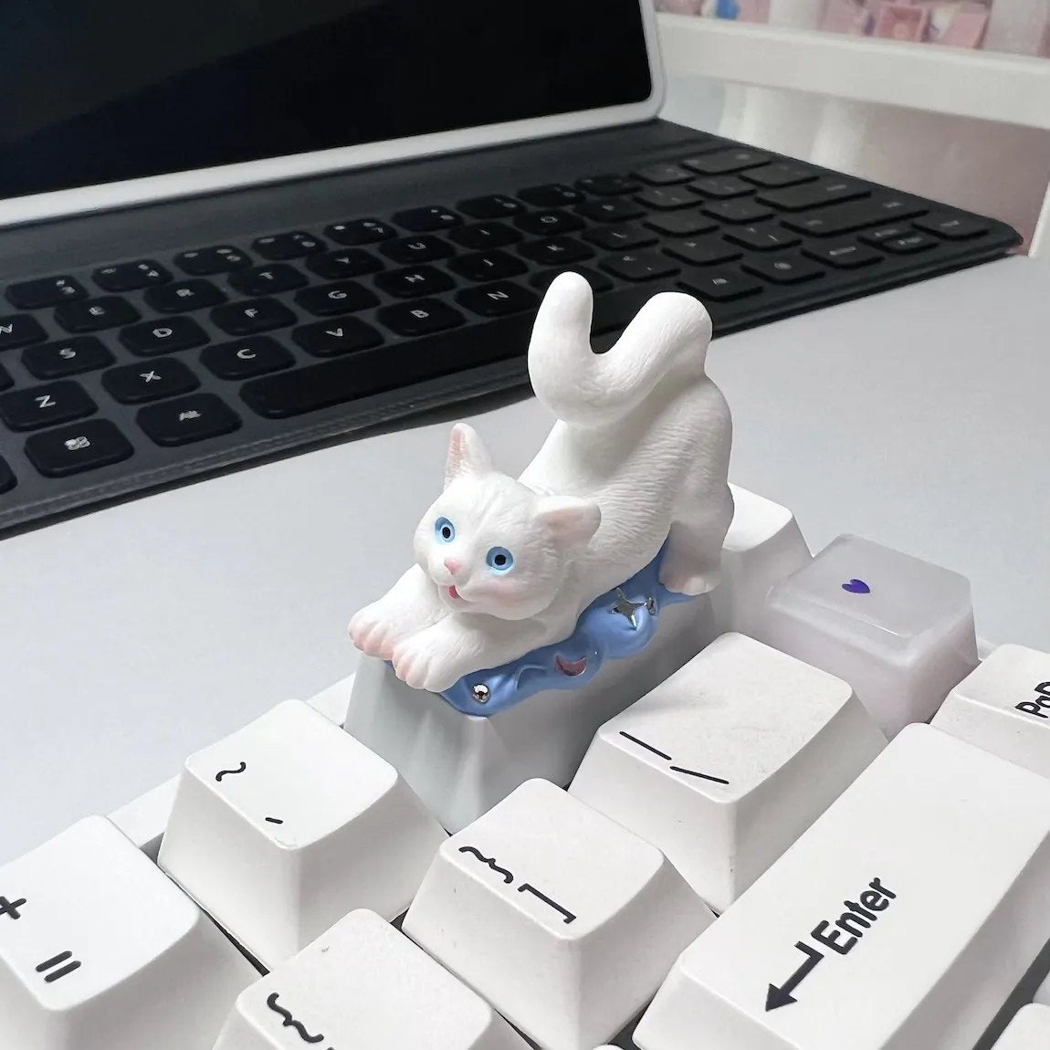 Introducing our "Cute White Cat Backspace 2U" Artisan Keycap – a purr-fect addition to your keyboard. Crafted with meticulous detail, this keycap features an adorable white cat design, adding a touch of charm to your mechanical keyboard. The 2U Backspace key becomes a canvas for the playful antics of our feline friend, making it an eye-catching and whimsical choice for cat lovers. Elevate your typing experience with this delightful keycap and let the cat-lover in you shine through.