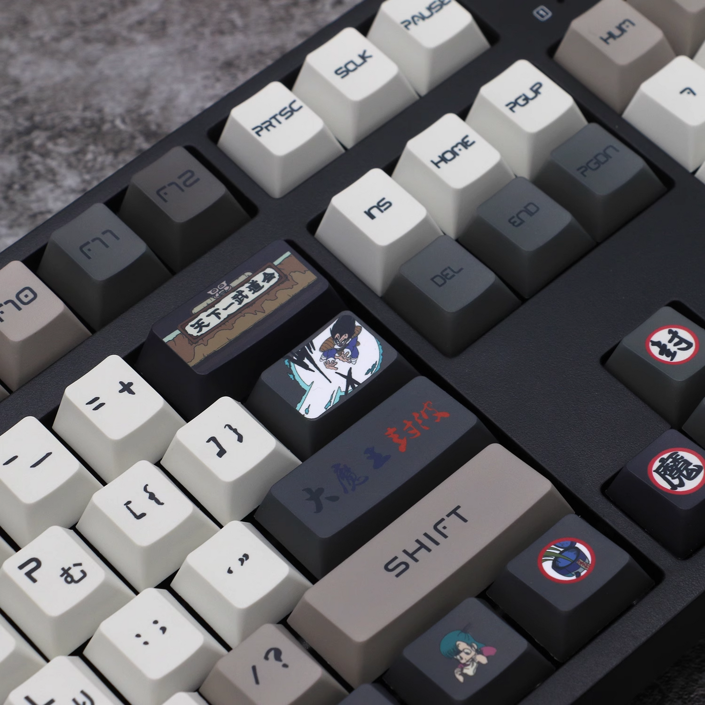 "Elevate your keyboard with our Dragon Ball-themed PBT keycaps featuring beloved characters like Goku and Vegeta. These personalized keycaps bring the power of Saiyans to your fingertips, with 2D anime-inspired designs that make your keyboard pop. Get the complete set and transform your typing experience into an anime adventure!"
