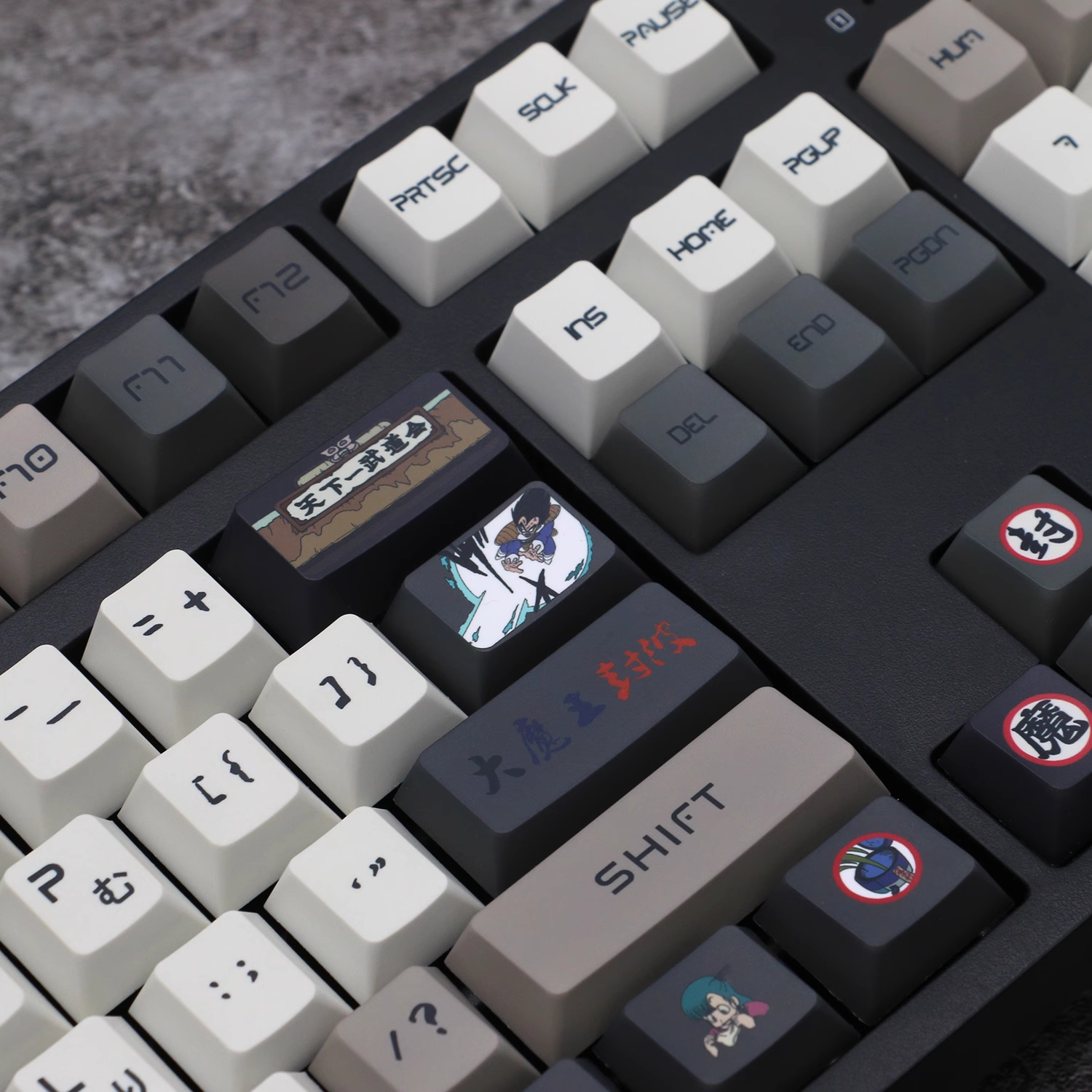 "Elevate your keyboard with our Dragon Ball-themed PBT keycaps featuring beloved characters like Goku and Vegeta. These personalized keycaps bring the power of Saiyans to your fingertips, with 2D anime-inspired designs that make your keyboard pop. Get the complete set and transform your typing experience into an anime adventure!"