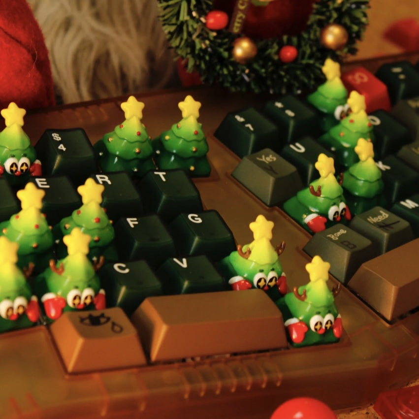 "Transform your mechanical wonderland with our Festive Xmas Tree Artisan Keycap. This unique and finely crafted keycap brings the holiday spirit to your fingertips. Adorned with a cheerful Christmas tree design, each keystroke becomes a festive celebration. Elevate your typing experience with the enchanting blend of style and holiday cheer. Upgrade your keyboard with this artisan keycap and let the festive magic of the season dance across your keys. Embrace the holiday spirit, one keystroke at a time!"