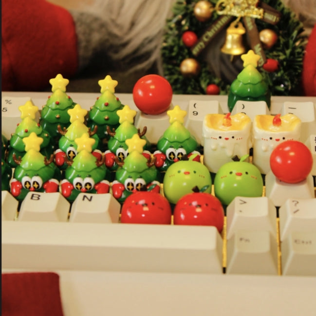 "Transform your mechanical wonderland with our Festive Xmas Tree Artisan Keycap. This unique and finely crafted keycap brings the holiday spirit to your fingertips. Adorned with a cheerful Christmas tree design, each keystroke becomes a festive celebration. Elevate your typing experience with the enchanting blend of style and holiday cheer. Upgrade your keyboard with this artisan keycap and let the festive magic of the season dance across your keys. Embrace the holiday spirit, one keystroke at a time!"