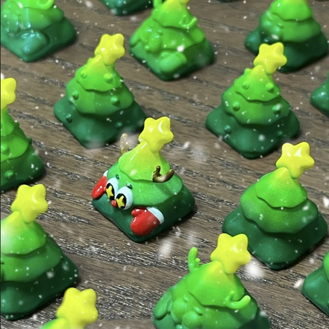"Transform your mechanical wonderland with our Festive Xmas Tree Artisan Keycap. This unique and finely crafted keycap brings the holiday spirit to your fingertips. Adorned with a cheerful Christmas tree design, each keystroke becomes a festive celebration. Elevate your typing experience with the enchanting blend of style and holiday cheer. Upgrade your keyboard with this artisan keycap and let the festive magic of the season dance across your keys. Embrace the holiday spirit, one keystroke at a time!"