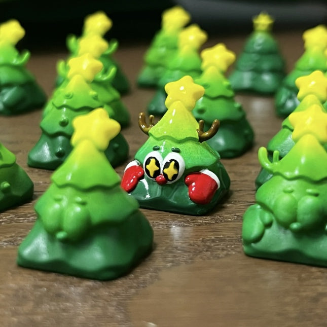 "Transform your mechanical wonderland with our Festive Xmas Tree Artisan Keycap. This unique and finely crafted keycap brings the holiday spirit to your fingertips. Adorned with a cheerful Christmas tree design, each keystroke becomes a festive celebration. Elevate your typing experience with the enchanting blend of style and holiday cheer. Upgrade your keyboard with this artisan keycap and let the festive magic of the season dance across your keys. Embrace the holiday spirit, one keystroke at a time!"