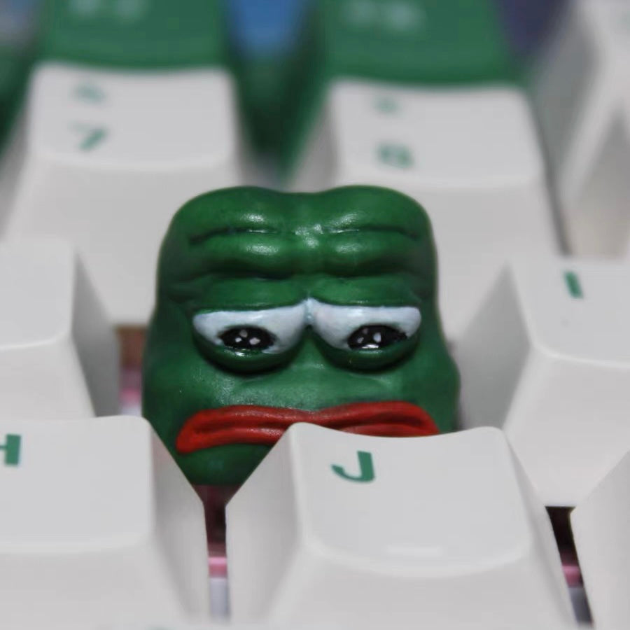 Crying Frog Keycaps Sad Frog and Funny Frog Custom Keycaps, perfect for adding character to your mechanical keyboard with a quirky green frog design.