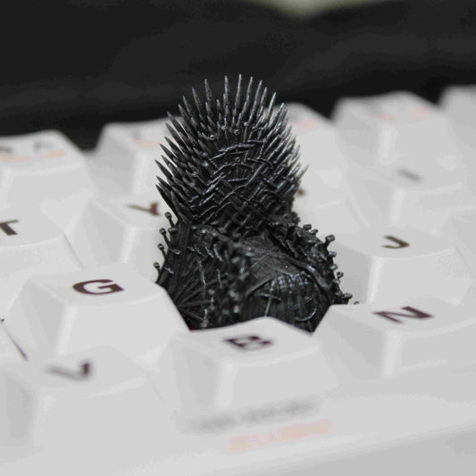 Iron Throne artisan keycap inspired by Game of Thrones, custom keycap for mechanical keyboards, ideal for fans of the series.