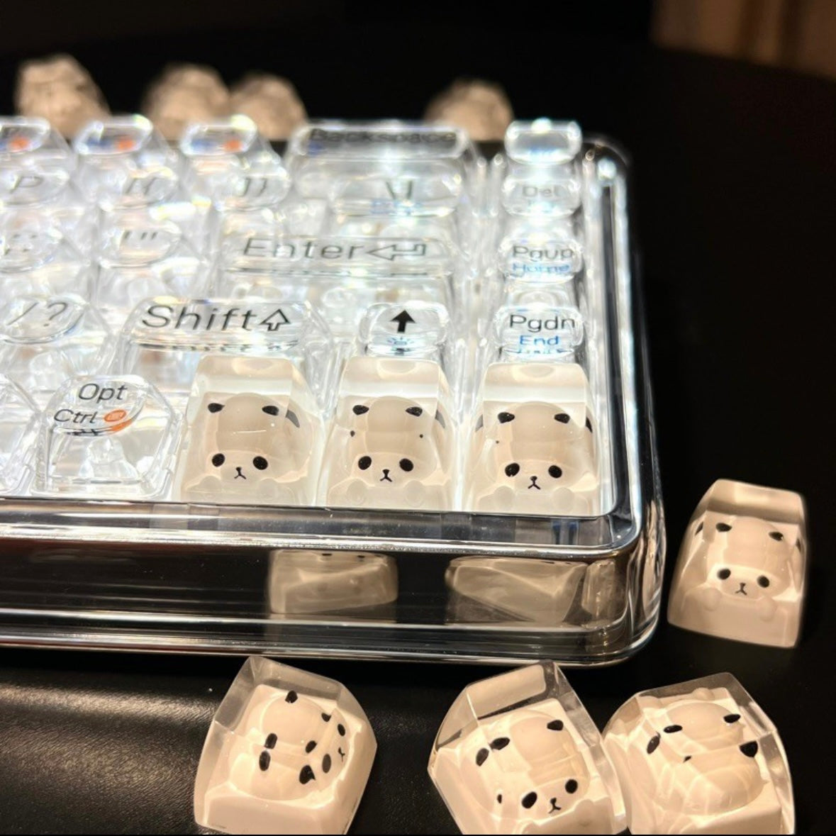 Immerse yourself in the enchanting world of this meticulously crafted resin panda keycap. This factory-original keycap is expertly designed for Cherry MX switches, ensuring a seamless fit on your keyboard. Its full-sized form guarantees compatibility across various keyboards, allowing you to infuse a touch of playfulness and personality into your typing experience.