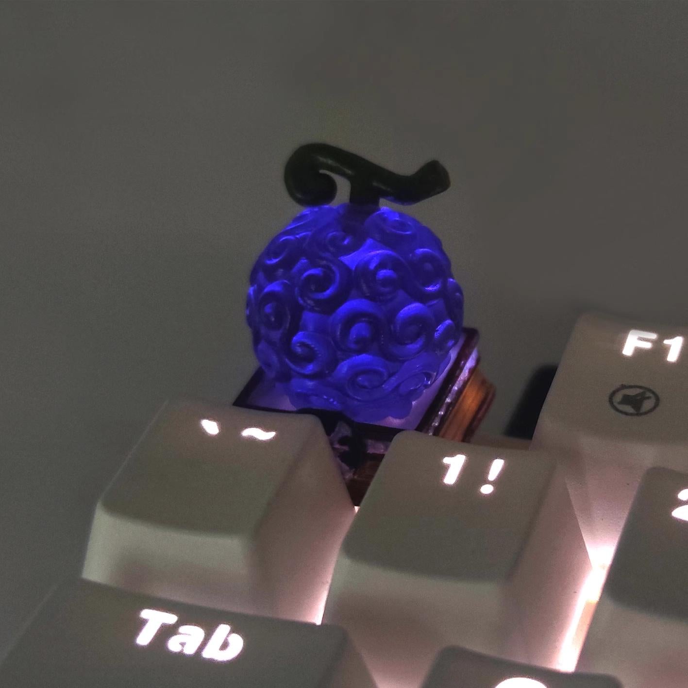 Set sail with ONE PIECE Devil's Fruit keycaps! These custom artisan keycaps offer intricate details and Cherry MX compatibility for a themed setup.