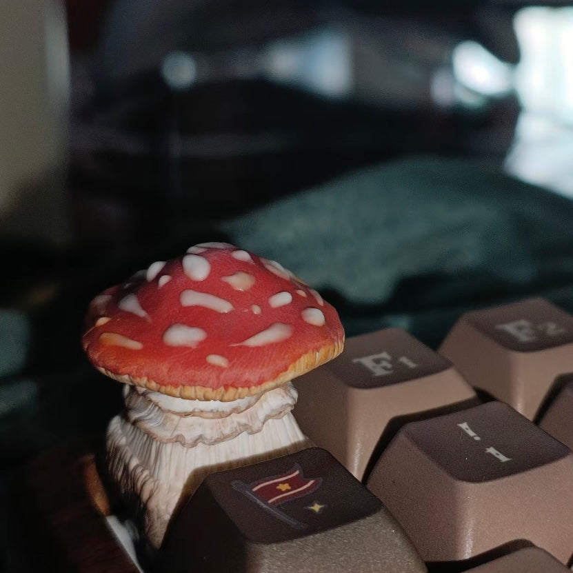 Vibrant red mushroom keycap showcasing intricate patterns, designed to bring a unique and enchanting flair to your mechanical keyboard setup.