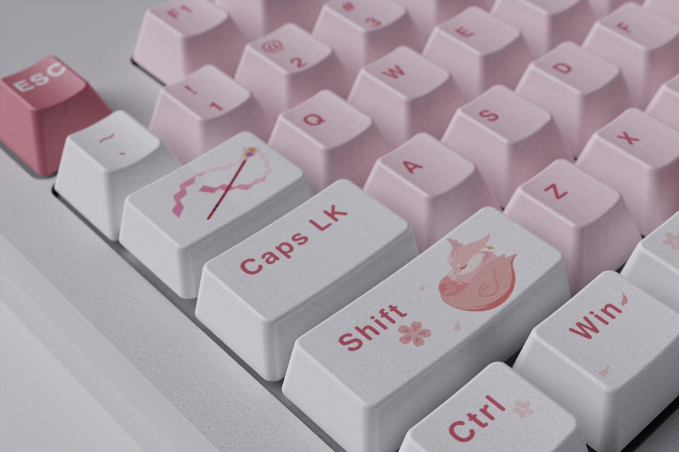 Elevate your gaming setup with Yae Miko artisan keycaps, featuring intricate Genshin Impact details for a unique and stylish keyboard accessory.