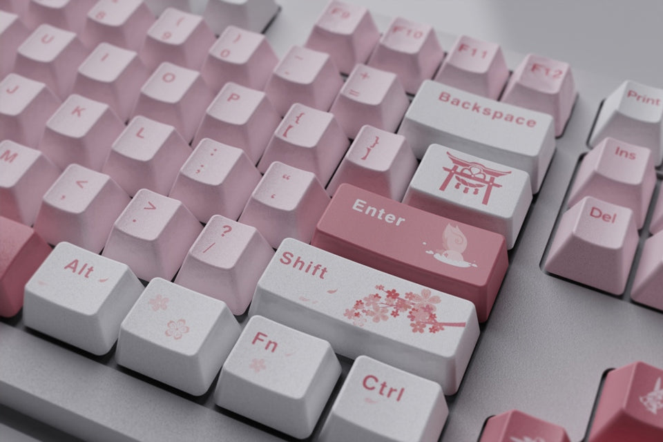Yae Miko-themed PBT keycaps for Genshin Impact fans. This premium keycap set offers durability and aesthetics for a one-of-a-kind typing experience.