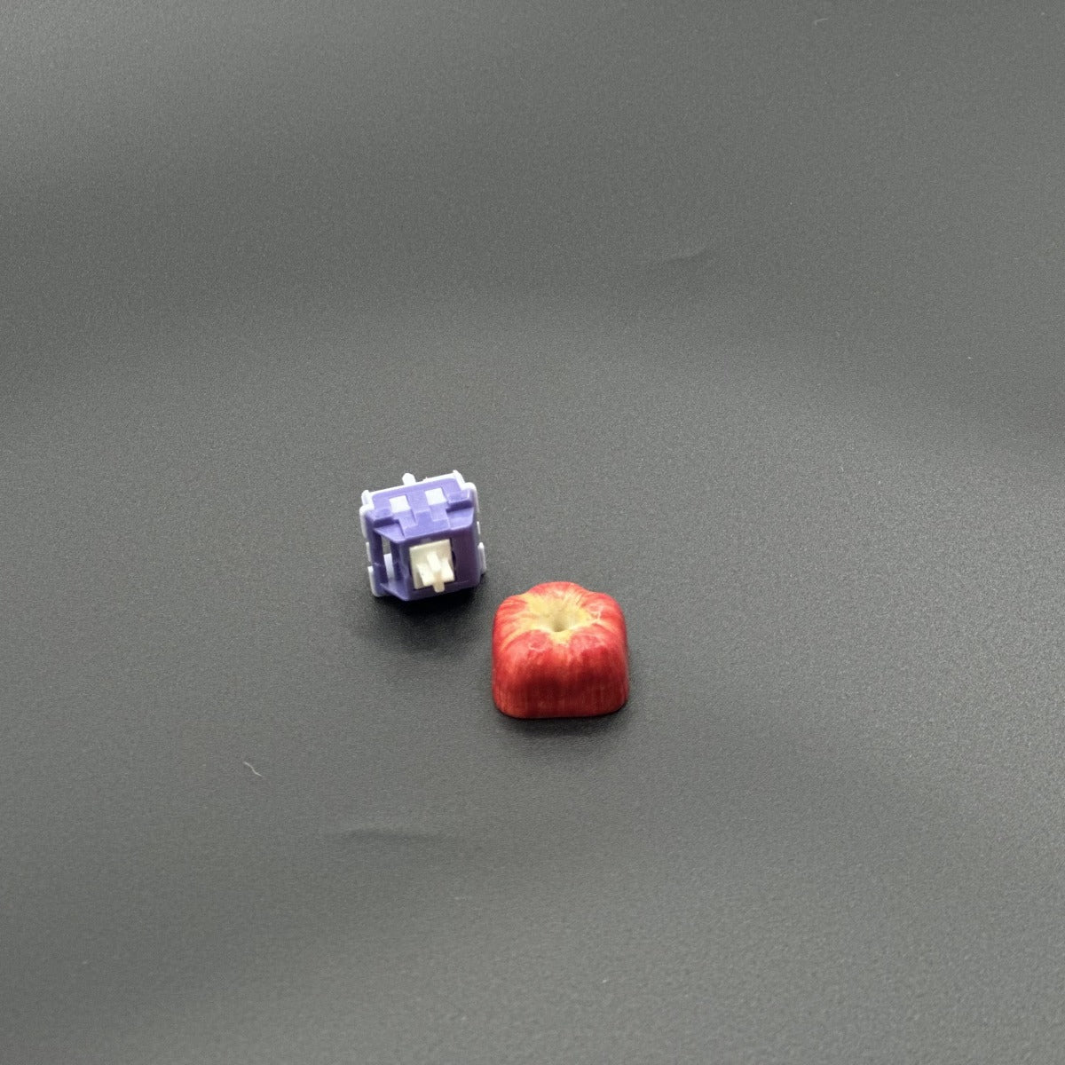 Personalized artisan apple keycap for Cherry MX switches, made by hand. Realistic apple details make it a standout addition to any keyboard setup.
