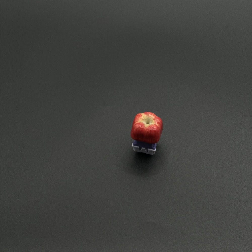 True-to-life ‘Touch the Apple’ artisan keycap, bringing apple-inspired beauty to your keyboard. Handmade, Cherry MX compatible, and unique.
