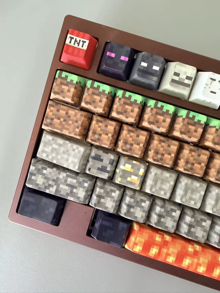 Close-up of Minecraft PBT OEM profile keycaps with character and block designs