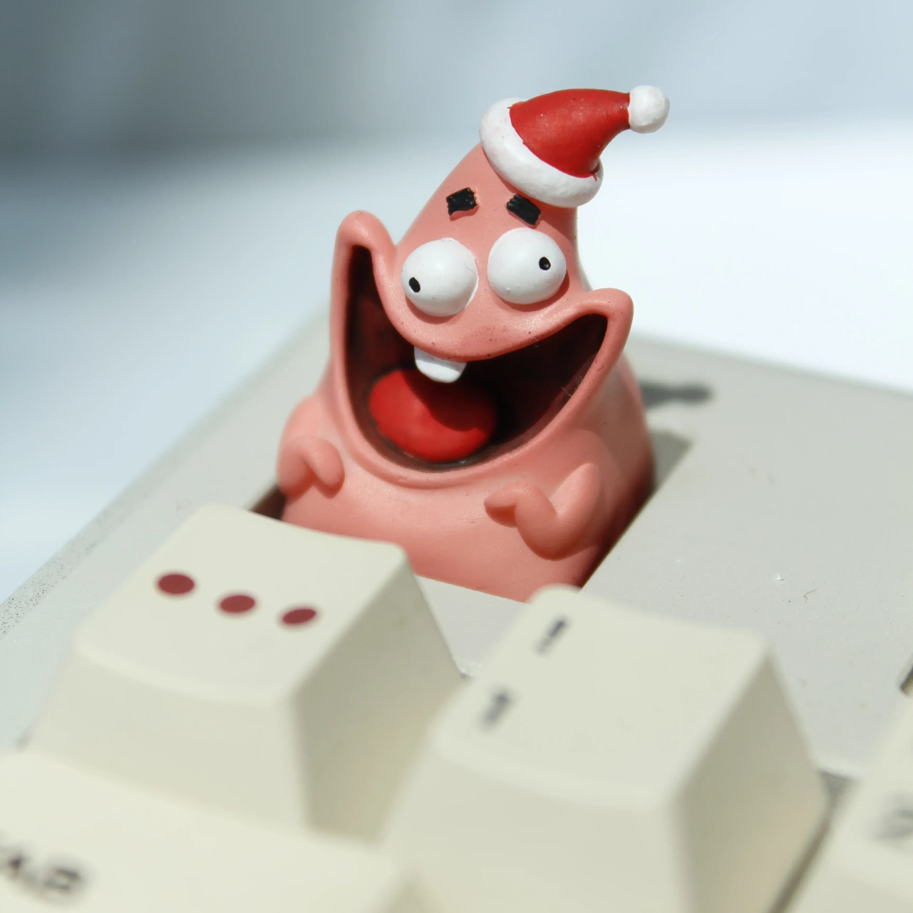 3D printed resin mask keycap featuring detailed helmet structures and mythical fantasy artwork