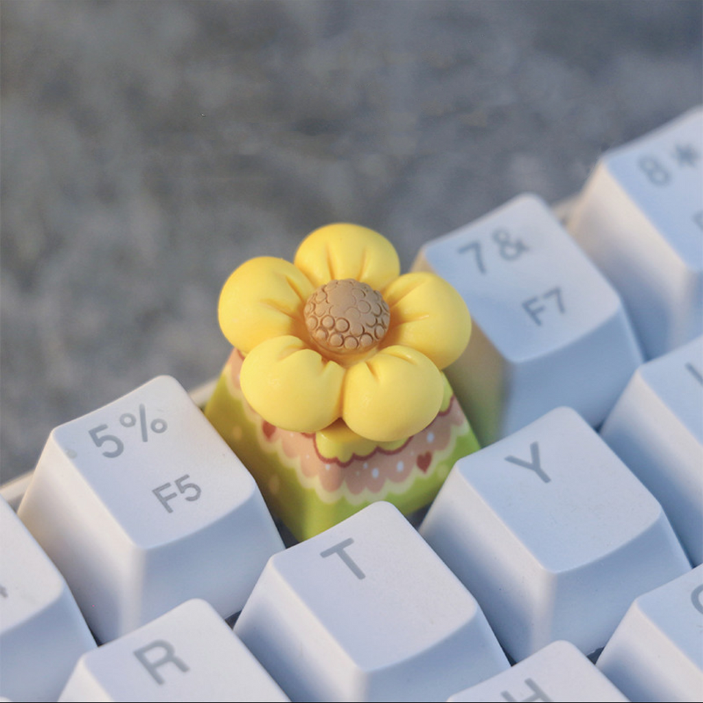 A Little Yellow Flower Artisan Custom keycap A Little Yellow Flower custom keycap, combining creativity and artistry for a refreshing and joyful addition to your keyboard setup.
