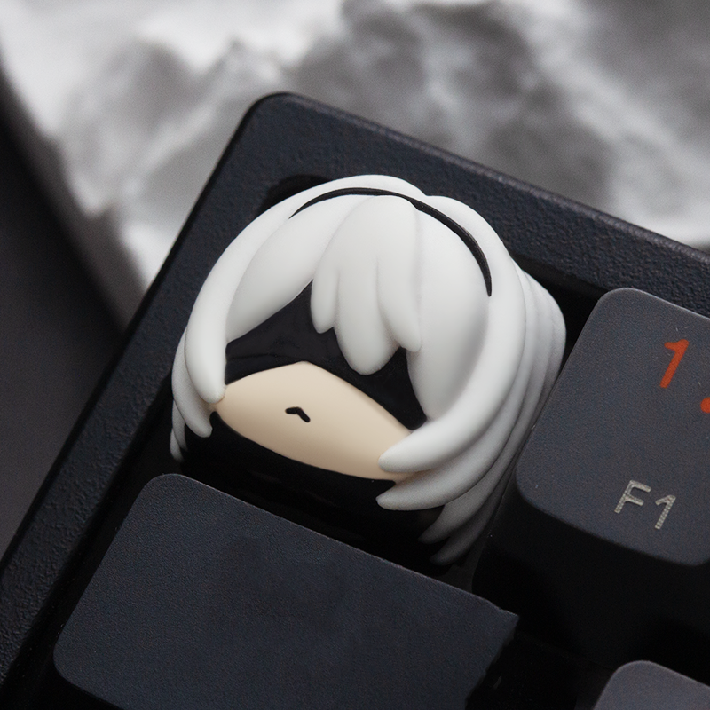 NieR: Automata 2B and 9S themed keycap, adding a dark, sci-fi flair to mechanical keyboards.