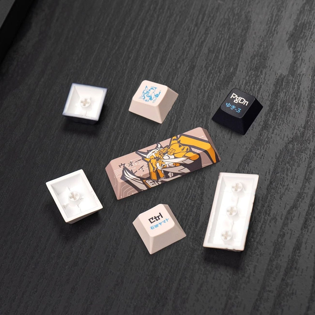 Custom mechanical keyboard keycaps inspired by the Digimon digital world. Featuring futuristic patterns, vibrant accents, and durable PBT construction, this anime keycap set brings nostalgia, adventure, and personality to any desktop setup.