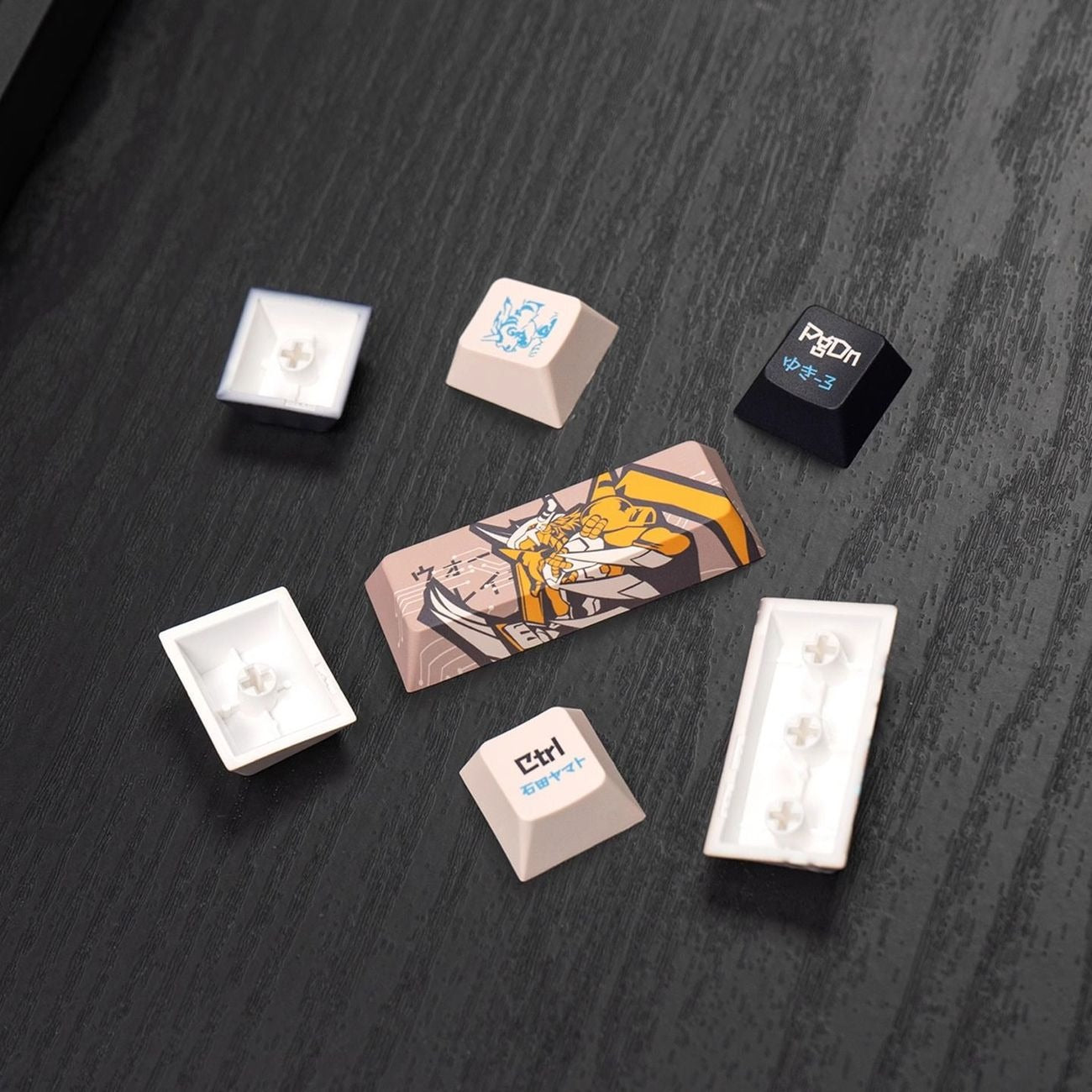 Custom mechanical keyboard keycaps inspired by the Digimon digital world. Featuring futuristic patterns, vibrant accents, and durable PBT construction, this anime keycap set brings nostalgia, adventure, and personality to any desktop setup.