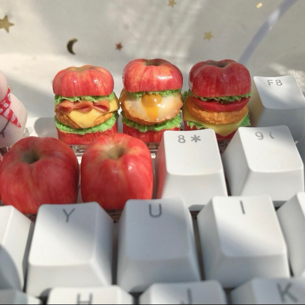 Handmade apple-inspired keycap for Cherry MX keyboards, adding a natural and personalized touch to any typing experience for apple lovers.
