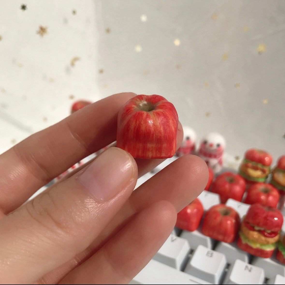 "One key, one apple. Our personalized keycap brings the beauty of the apple to your keyboard experience. Unique and exquisite, this keycap adds a touch of apple charm to your keyboard."