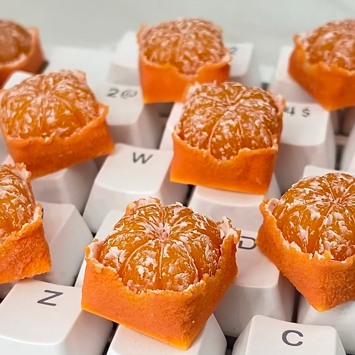 A square Orange or Tangerine Artisan keycap Custom keycaps The simulated orange keycaps are like a real little orange on your keycaps, it's like I can smell the orange through the computer screen.