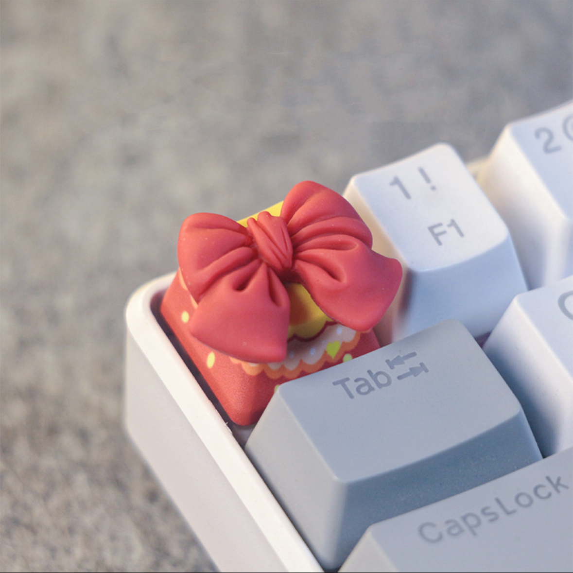 "Elevate your keyboard's style with our unique Bow Tie Custom Artisan Keycaps from AIHey Studio. Handcrafted with attention to detail, these keycaps are designed to add a touch of elegance to your setup. Each keycap features a bow tie design, making a fashion statement while you type. From AIHey Studio, known for the best artisan keycaps, these are the epitome of craftsmanship and style. Stand out from the crowd with these one-of-a-kind artisan keycaps." 🎩💻 #KeyboardAccessories #ArtisanKeycaps #BowTieDesign