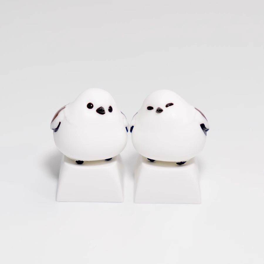 Embrace the charm of chubby mountain sparrows with our adorable white keycap. Add a touch of nature's delight to your keyboard. Tweet your way to a unique typing experience!
