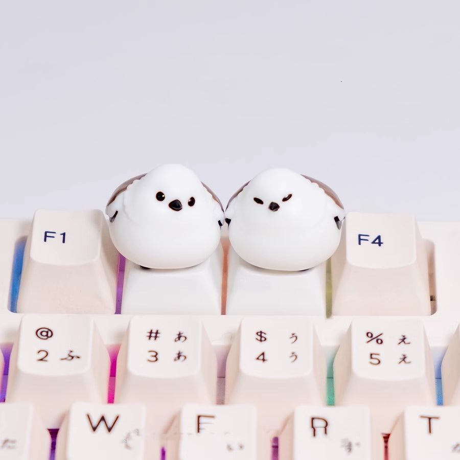 Embrace the charm of chubby mountain sparrows with our adorable white keycap. Add a touch of nature's delight to your keyboard. Tweet your way to a unique typing experience!