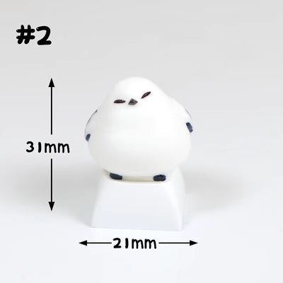 Embrace the charm of chubby mountain sparrows with our adorable white keycap. Add a touch of nature's delight to your keyboard. Tweet your way to a unique typing experience!