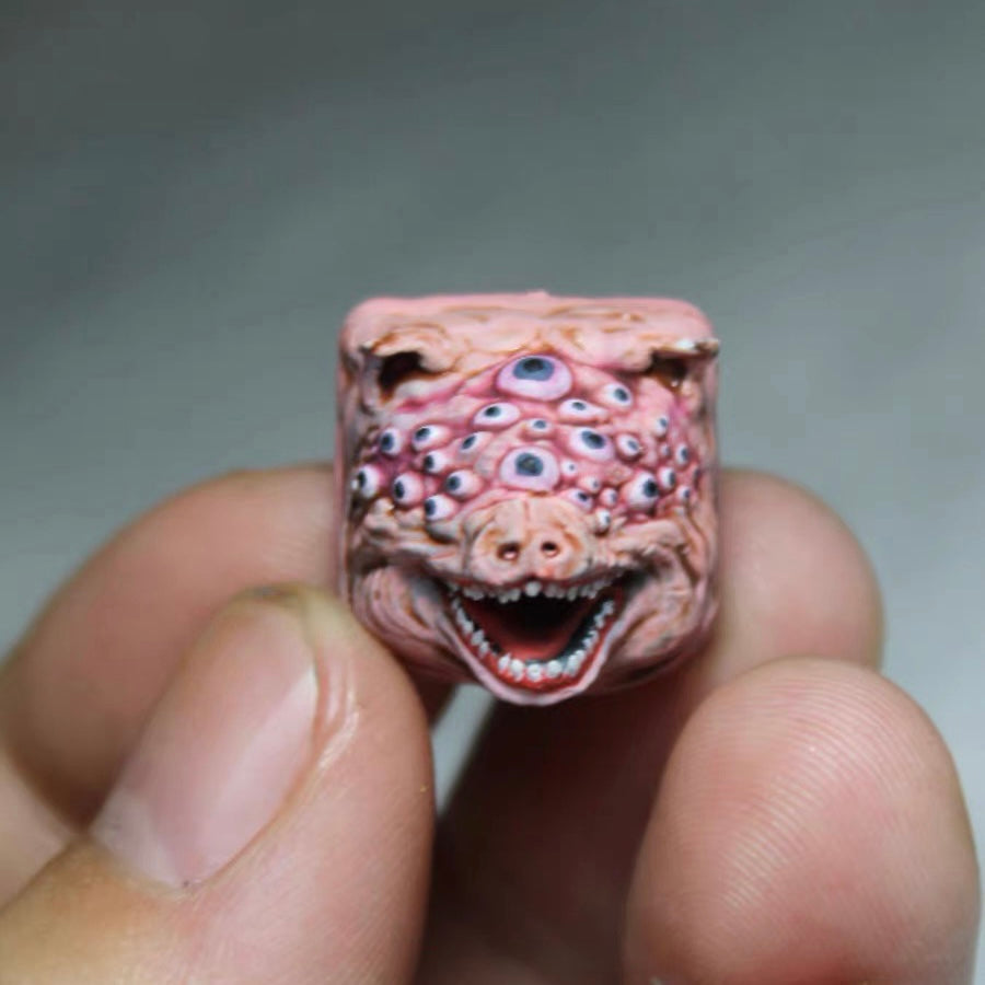 Elevate your keyboard with our Bloodborne Cthulhu Piggy Custom Artisan Keycaps. These bold keycaps are intricately designed with Cthulhu elements, adding a touch of cosmic horror to your typing experience. Handcrafted with precision, they bring a unique and eerie charm to your keyboard setup. Stand out from the crowd and embrace the darkness with these captivating keycaps." 🦑🎮💻 #KeyboardAccessories #ArtisanKeycaps #CthulhuDesigns