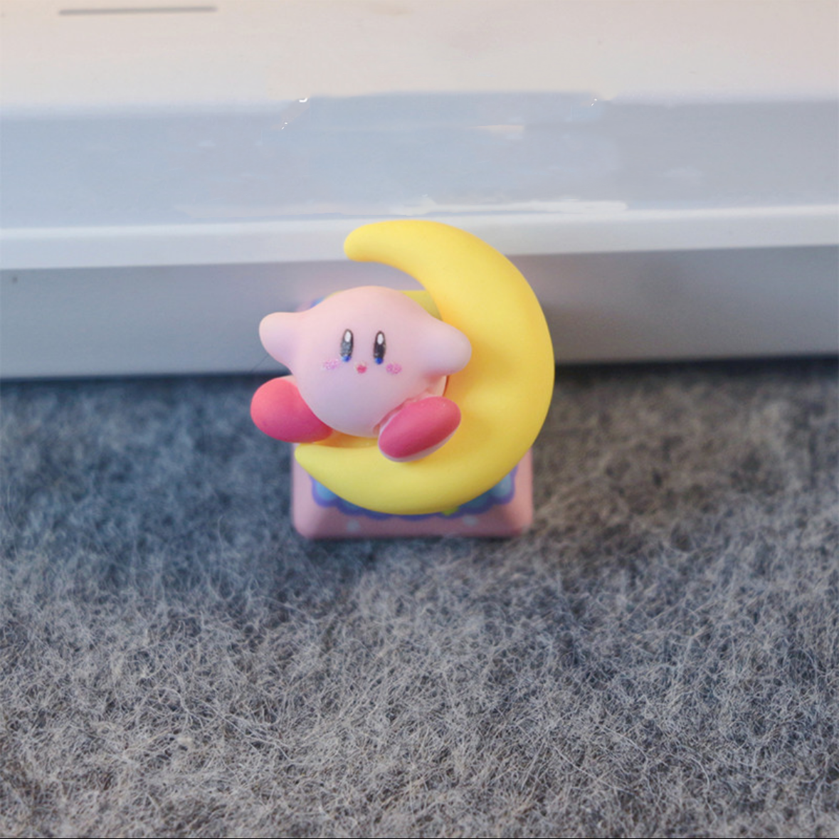Custom Kirby and Moon Artisan Keycap featuring the iconic character and a whimsical moon design, perfect for enhancing your keyboard's charm.

