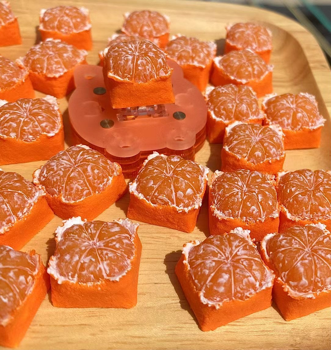 Custom keycap featuring a square design of an Orange or Tangerine, designed for artisan keycap enthusiasts.
