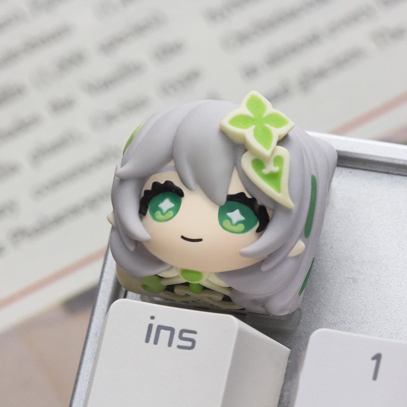 Stunning resin keycap inspired by Nahida, perfect for fans looking to elevate their keyboard aesthetics with Genshin Impact flair.
