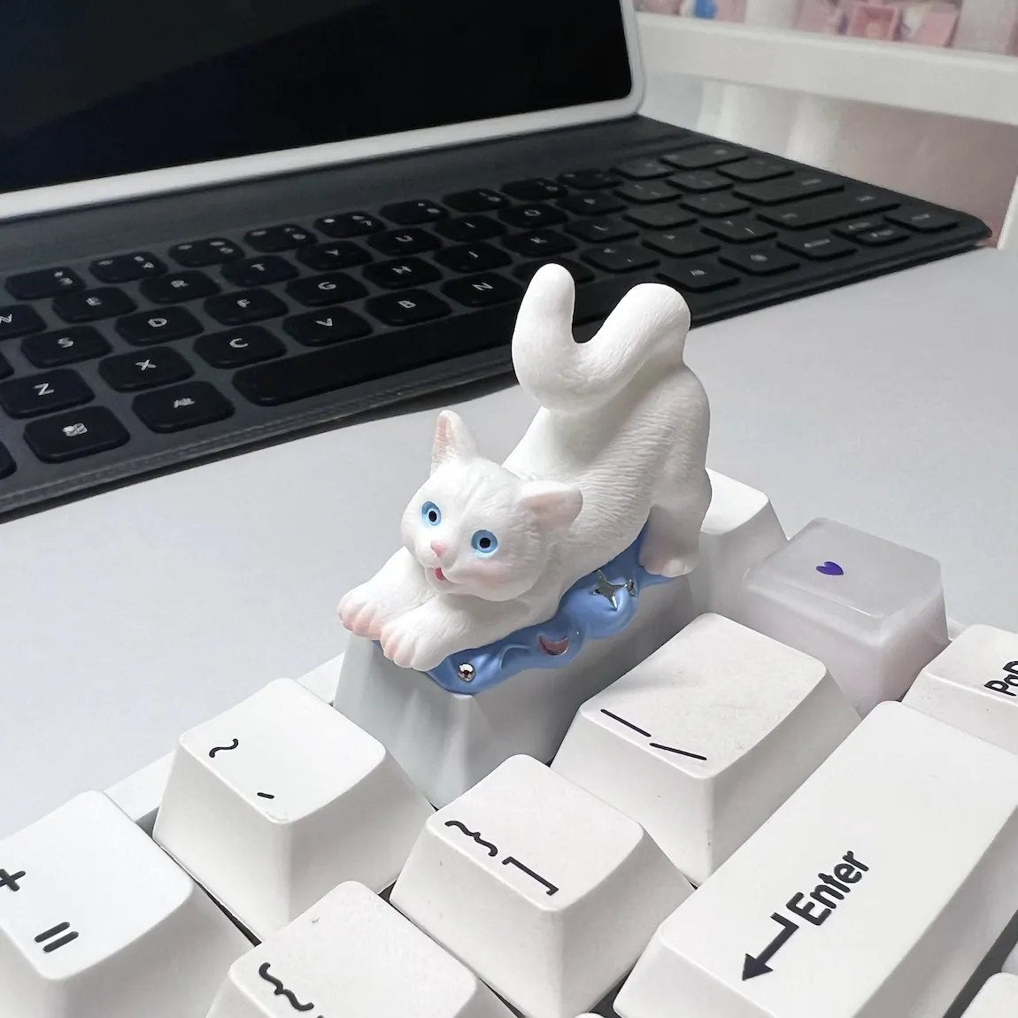 Introducing our "Cute White Cat Backspace 2U" Artisan Keycap – a purr-fect addition to your keyboard. Crafted with meticulous detail, this keycap features an adorable white cat design, adding a touch of charm to your mechanical keyboard. The 2U Backspace key becomes a canvas for the playful antics of our feline friend, making it an eye-catching and whimsical choice for cat lovers. Elevate your typing experience with this delightful keycap and let the cat-lover in you shine through. 
