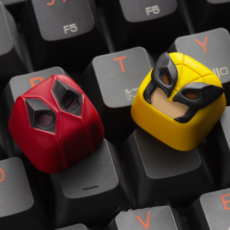 Deadpool and Wolverine artisan keycaps by aiheystudio inspired by X-Men Origins characters.
