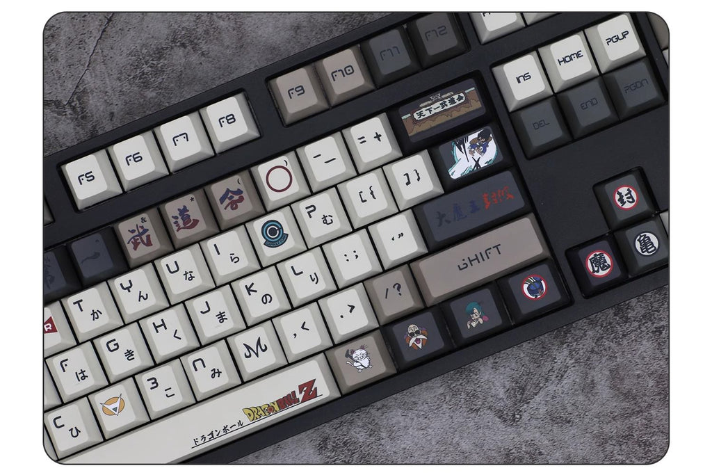 Saiyan-inspired Goku and Vegeta keycaps in durable PBT material, designed for Dragon Ball fans looking to personalize their keyboards.
