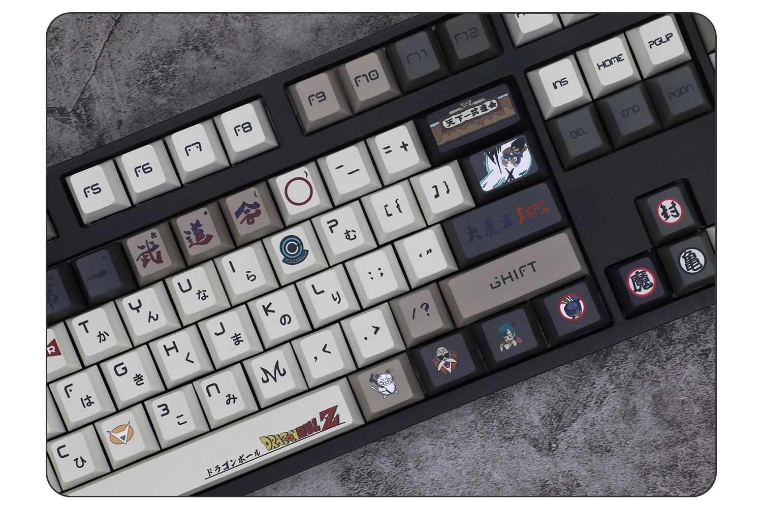 Saiyan-inspired Goku and Vegeta keycaps in durable PBT material, designed for Dragon Ball fans looking to personalize their keyboards.
