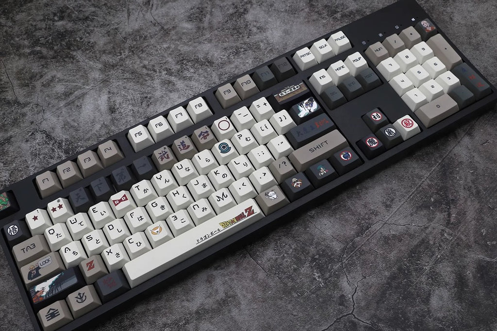 Full set of Dragon Ball custom keycaps showcasing Goku and Vegeta, ideal for transforming your keyboard with Saiyan energy.
