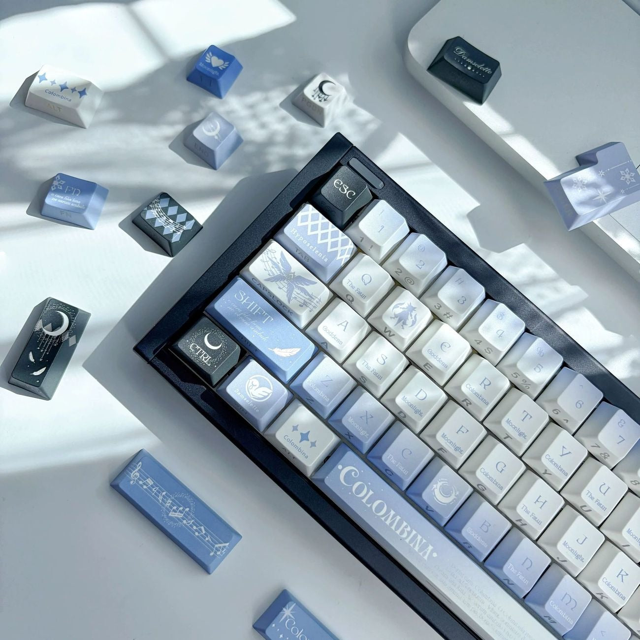 Dreamy Moon Girl anime keycaps featuring a fantasy night sky design with blue and white tones. The durable PBT construction and translucent legends create a beautiful mechanical keyboard accessory for anime fans and aesthetic desk setups.