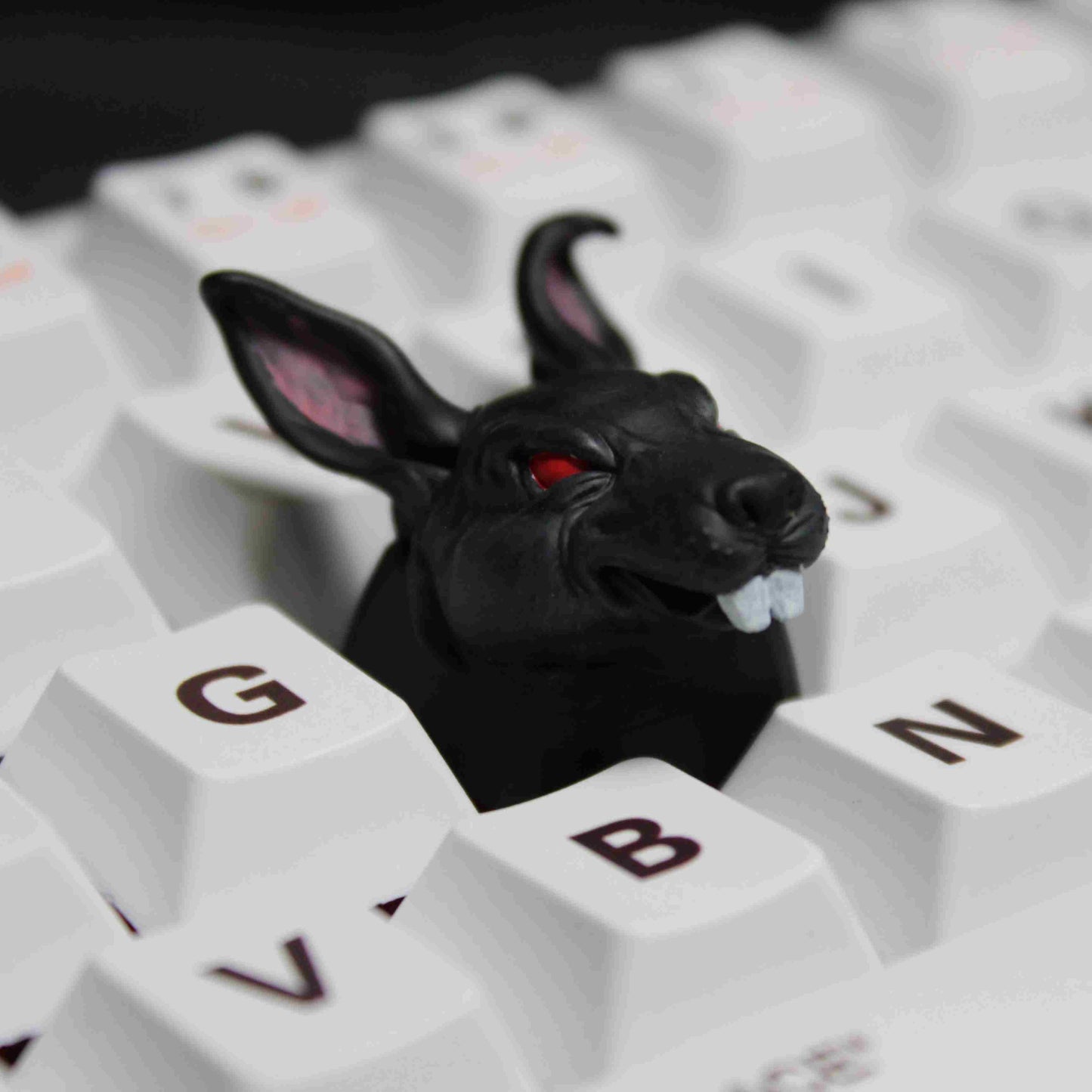 🐰 Evil Bunny Unleashed: Dive into the dark whimsy of Halloween with our Evil Bunny Artisan Keycaps. These black rabbits are not your ordinary bunnies; they're mischievous, spooky, and ready to bring a touch of eerie delight to your keyboard.