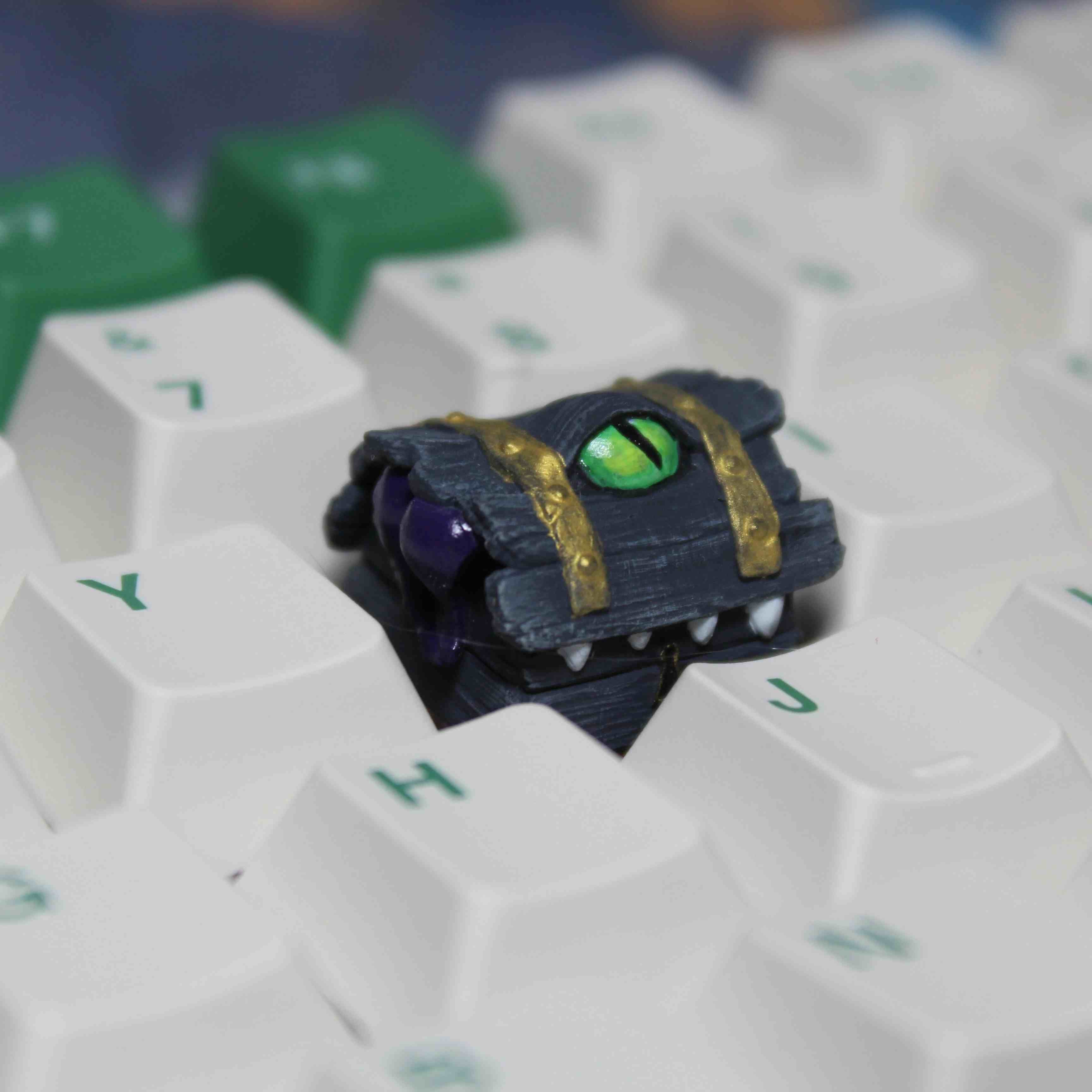 Custom artisan keycaps inspired by Fantastic Beasts and Harry Potter, featuring monster treasure chests for mechanical keyboards.
