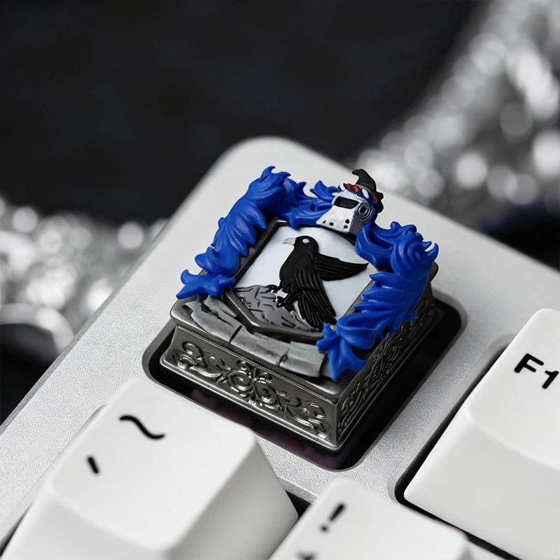 Wizard school inspired resin artisan keycap featuring iconic magical house crest artwork. Perfect for fantasy collectors, anime style desk setups, gaming keyboards, and mechanical keyboard customization.