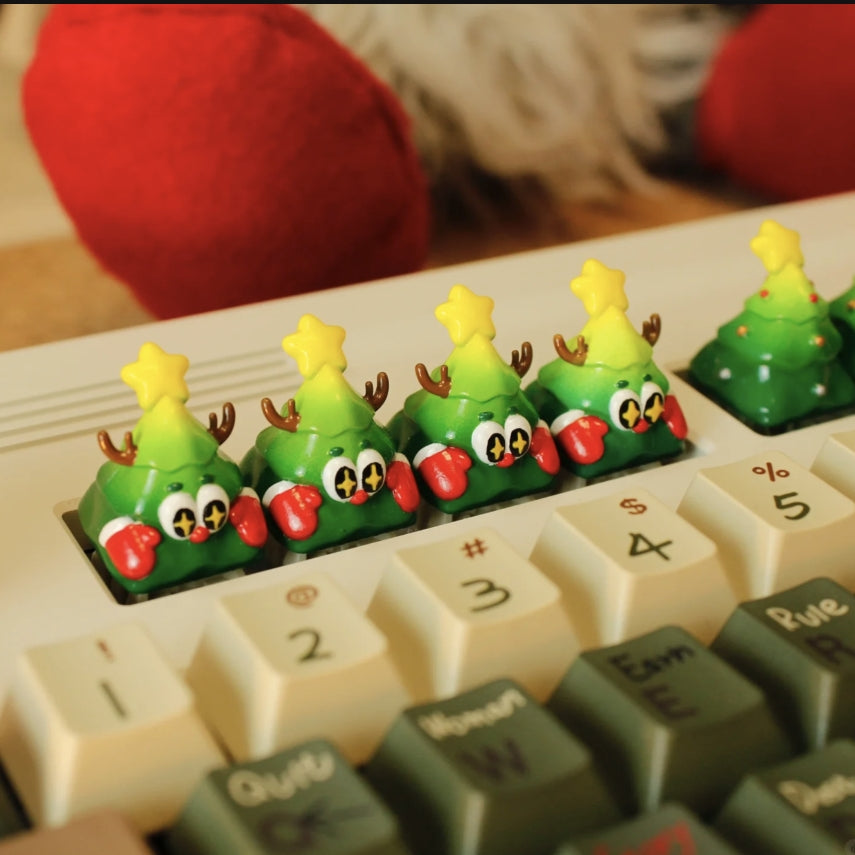 "Transform your mechanical wonderland with our Festive Xmas Tree Artisan Keycap. This unique and finely crafted keycap brings the holiday spirit to your fingertips. Adorned with a cheerful Christmas tree design, each keystroke becomes a festive celebration. Elevate your typing experience with the enchanting blend of style and holiday cheer. Upgrade your keyboard with this artisan keycap and let the festive magic of the season dance across your keys. Embrace the holiday spirit, one keystroke at a time!"