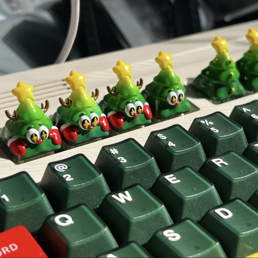 "Transform your mechanical wonderland with our Festive Xmas Tree Artisan Keycap. This unique and finely crafted keycap brings the holiday spirit to your fingertips. Adorned with a cheerful Christmas tree design, each keystroke becomes a festive celebration. Elevate your typing experience with the enchanting blend of style and holiday cheer. Upgrade your keyboard with this artisan keycap and let the festive magic of the season dance across your keys. Embrace the holiday spirit, one keystroke at a time!"
