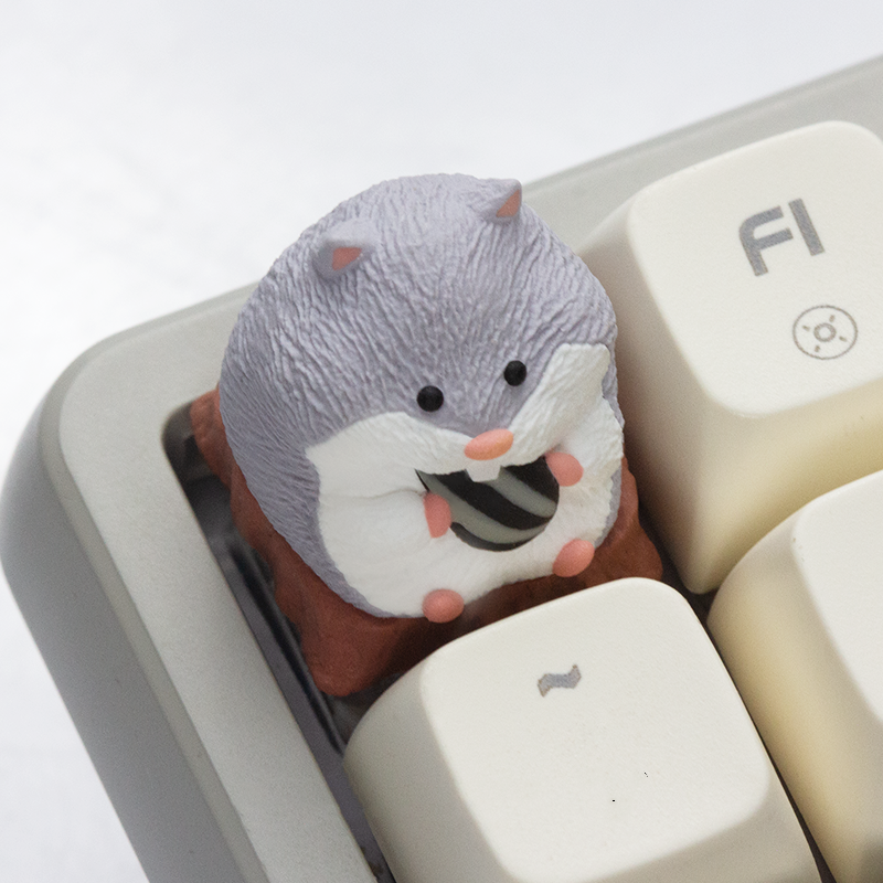 aiheystudio artisan keycap featuring a tiny hamster design with playful expression and sculpted detail.
