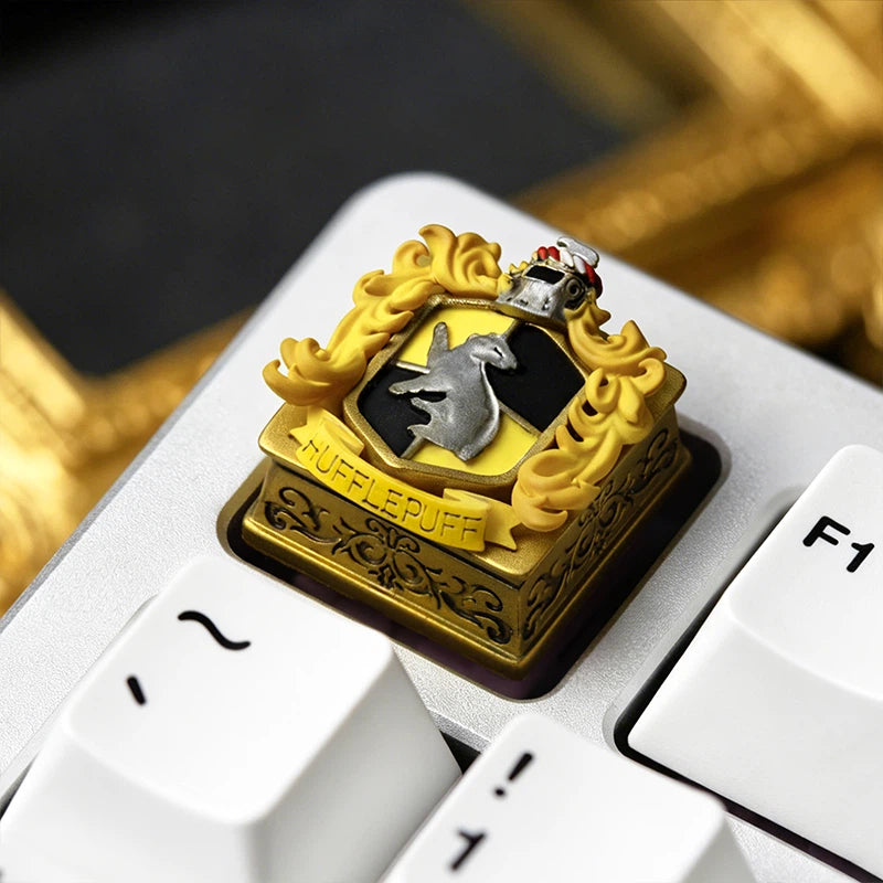 Unique epoxy resin artisan keycap inspired by Hogwarts School of Witchcraft and Wizardry. The detailed crest design, layered resin effect, and handmade polishing process create a premium fantasy keyboard accessory.